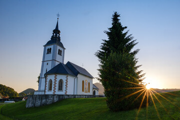 Wall Mural - Suha church in Škofja Loka in sunset