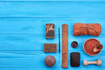 Wall Mural - Flat lay set of brown stuff on blue wooden table.