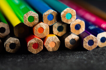 Sticker - Beautiful shallow focus photo of a set of pencils on a black surface