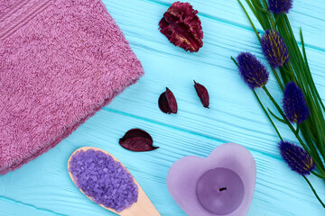 Wall Mural - Flat lay arrangement of spa bathroom stuff on blue wood.