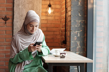 Poster - Woman in Hijab Texting Sms