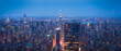 New York City Skyline with Urban Skyscrapers at Night Aerial View