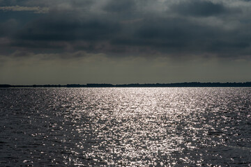 Wall Mural - clouds over lake