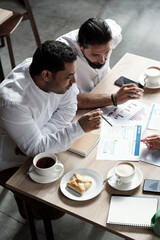 Poster - Middle Eastern Men Working With Data