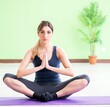© Elnur - Woman doing exercises at home