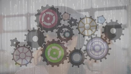 Poster - Animation of cogs moving over woman wearing vr headset
