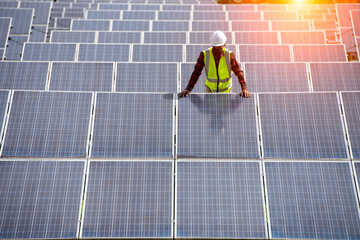Wall Mural - solar cells installing a solar cell on a roof