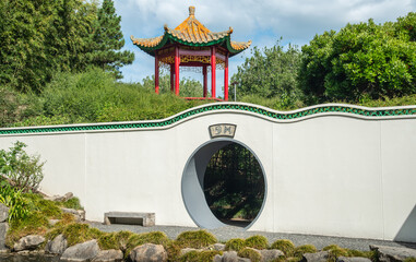 Wall Mural - Beautiful Chinese garden in Hamilton, New Zealand. Chinese gardens blend unique, ornate buildings with natural elements.