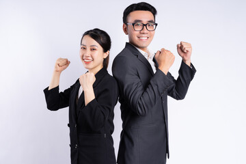 Sticker - Asian businessman and businesswoman posing on white background