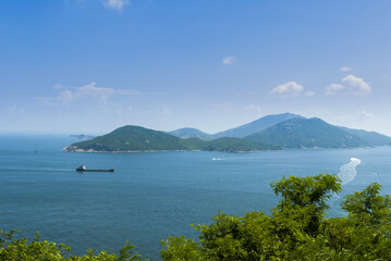 Poster - Big cargo ship on the horizon.