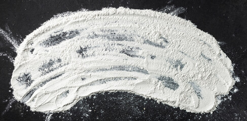 Aufkleber - Abstract baking background with flour on black table top view