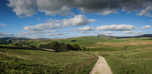 Gravel Path Leading Into The Yorkshire Dales National Park With Penyghent In The Background.