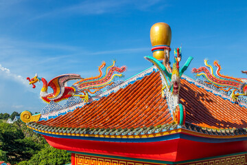 Sticker - Chinese dragon statue on a roof of a temple