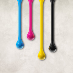 Wall Mural - cmyk ink drops on white concrete square background