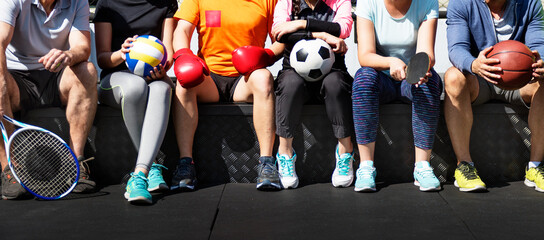 Group of diverse athletes sitting together