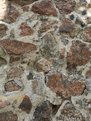 The outer stone wall of the Vyborg Castle in the city of Vyborg