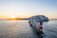 The Needles Isle Of Wight With The Needles Lighthouse Taken From The Air At Dawn With A Still Sea And Crisp Light.