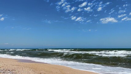 Wall Mural - Sea view with waves on a sunny day. Recreation and tourism concept