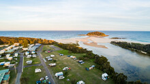 Coastal Holiday Caravan Park And River Mouth Looking Out To Ocean Water