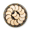 Traditional Moroccan handmade cookies on a plate, isolated on white.