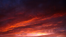 Red Sunset Sky With Dramatic Clouds