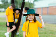 © Austockphoto - Portrait of Aussie child at public school with sun hat on