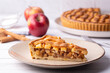 © Esin Deniz - Homemade Apple Pies on a white wooden background, top view. The classic fall Thanksgiving dessert - organic apple pie. (Turkish name; elmali turta)