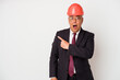 © Asier - Senior american arquitech man isolated on white background pointing to the side