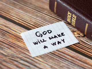Wall Mural - God will make a way. Firm trust in Jesus Christ. Hope, love, faith blessings from His promises. Holy Bible book on wooden background. The biblical concept of faithfulness and truth.