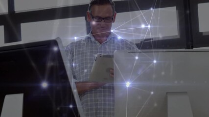 Poster - Animation of network of connections over businessman using tablet