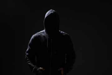 Silhouette of anonymous man on black background