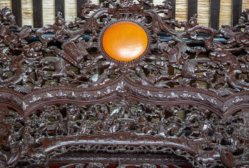 The mahogany carved roof and murals in the Chen Clan Ancestral Hall in Guangzhou