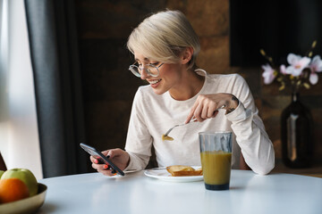 Wall Mural - Smiling young woman wearing casual clothes