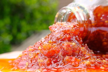 Poster - chilli sauce on table, macro chilli sauce and sauce with chicken