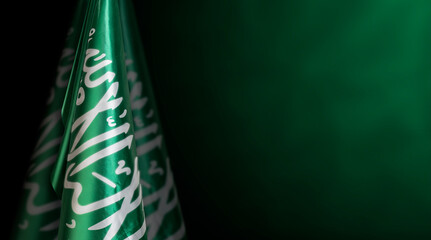 Saudi Arabia flags on left side with a dark green background, use it for national day and country national occasions