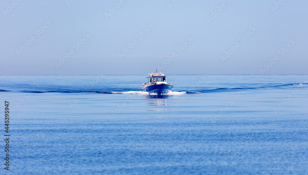 Greece. Aegean sea. Boat cruising. Blue sky and calm sea water background - obrazy, fototapety, plakaty 