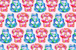 © Flavia Morlachetti/Westend61 - Pattern of rows of red and blue skull masks decorated with floral print