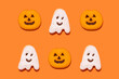 © Gemma Ferrando/Westend61 - Studio shot of ghost and jack o lantern-shaped Halloween cookies