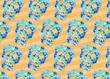 © Flavia Morlachetti/Westend61 - Pattern of rows of blue skull masks decorated with floral print
