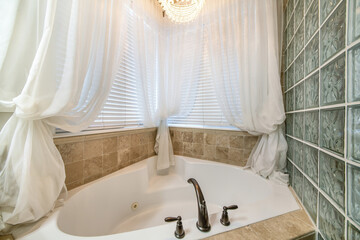 Sticker - Bath tub with curtains in a bathroom