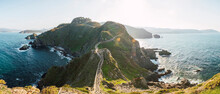 Panorama Of Elevated Walkway Stretching Along Coastal Cliffs At Sunset