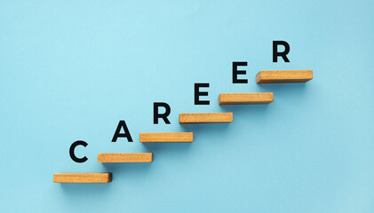 Wall Mural - Career word on staircase on blue background. Increasing business, success process concept. Copy space