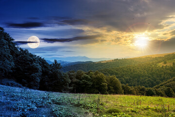 day and night time change concept above countryside landscape. carpathian mountains beneath a sky wi