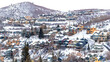 Pano Outside with a lot of colorful houses covered in snow.