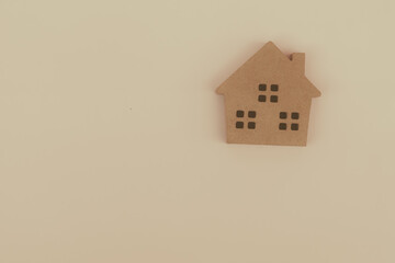 Wall Mural - house wood model concept on blue background and copy space for your text investment insurance and home purchase mortgage real estate concept