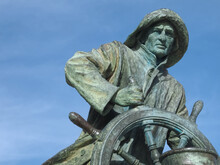 Sculpture Of A Sailor With A Wheel In A Public Park In Porto In Portugal