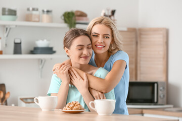 Sticker - Beautiful young sisters in kitchen