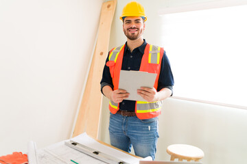 Wall Mural - Portrait of a happy constructor working