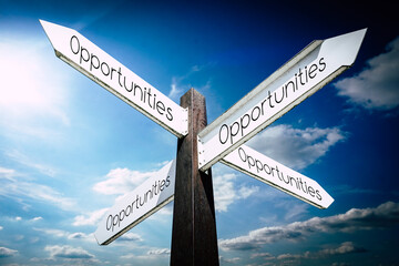 Wall Mural - Opportunities concept - signpost with four arrows