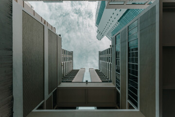 Poster - Low angle shot of a residential building with spacious balconies